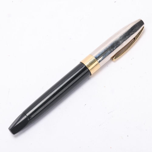 593 - A Sheaffer Legacy Heritage fountain pen, with black body and palladium cap and 18ct gold nib