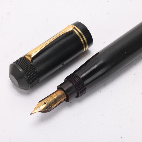 594 - A Ford's Patent fountain pen, circa 1930, black rubber body, nib marked 428 Mill, 14ct,  length 16 c... 