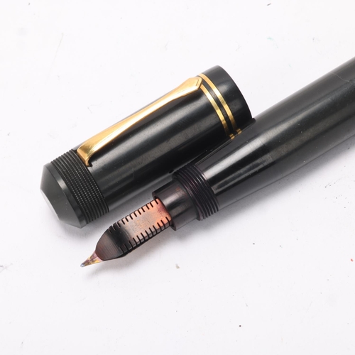 594 - A Ford's Patent fountain pen, circa 1930, black rubber body, nib marked 428 Mill, 14ct,  length 16 c... 