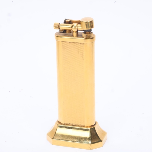 601 - A vintage Dunhill gold plated table lighter,  makers marks to base, No 18763, height 10cm