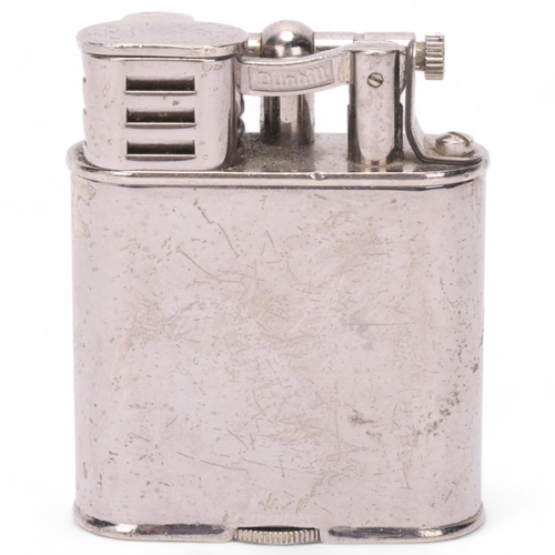 604 - A vintage Dunhill silver plated lighter, makers marks to base, height 5.5cm