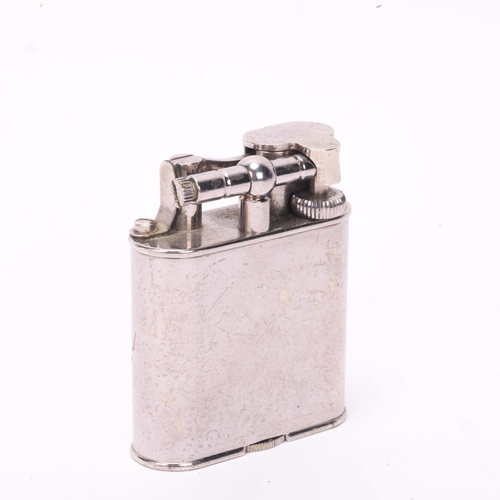 604 - A vintage Dunhill silver plated lighter, makers marks to base, height 5.5cm