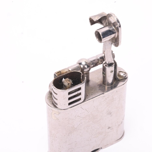 604 - A vintage Dunhill silver plated lighter, makers marks to base, height 5.5cm