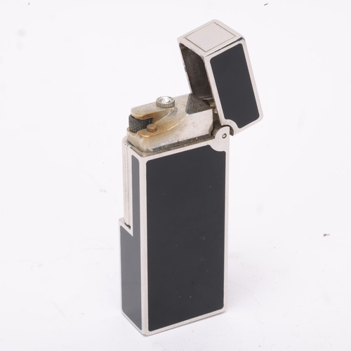 608 - **WITHDRAWN**A vintage Dunhill silver plated Rollagas lighter, with black lacquer detail and paste g... 