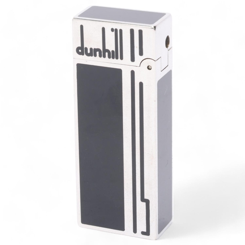 609 - **WITHDRAWN**A vintage Dunhill silver plated Rollagas lighter, with black lacquer detail and paste g... 