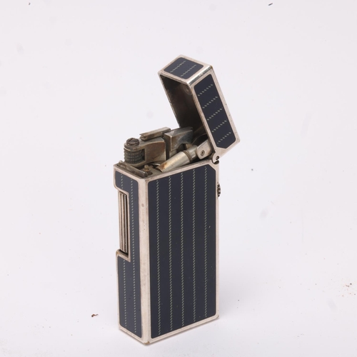 611 - A vintage Dunhill Rollagas lighter, silver plated with detailed black lacquer panels, makers marks t... 