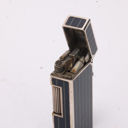 611 - A vintage Dunhill Rollagas lighter, silver plated with detailed black lacquer panels, makers marks t... 