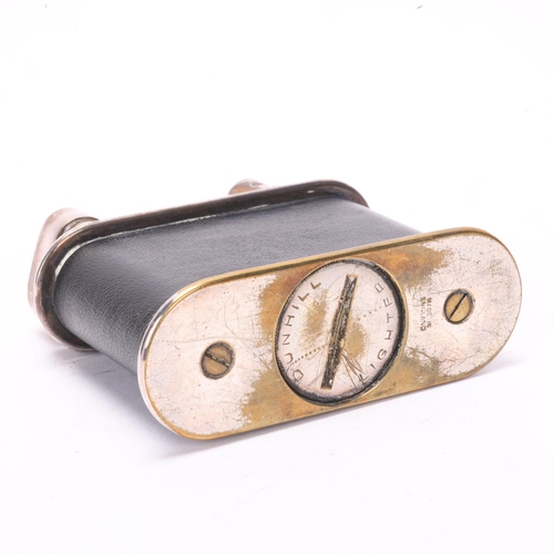 612 - A vintage Dunhill desk lighter, silver plate with leather cover, Reg No 737418, marked Dunhill Made ... 