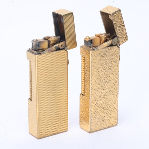 619 - 2 vintage Dunhill gold plated Rollagas lighters, makers marks to base, length 6.3cm