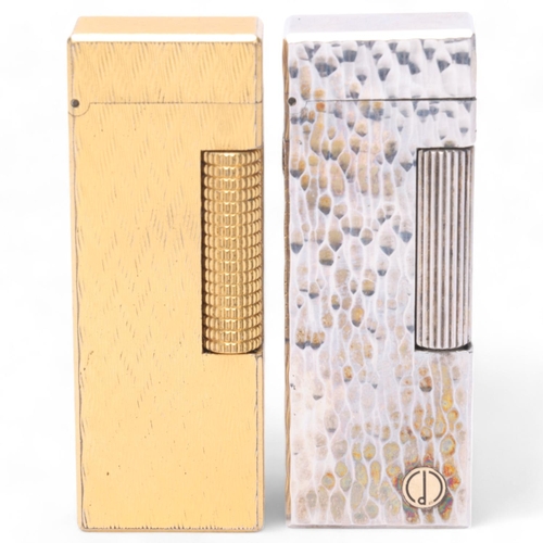 620 - 2 vintage Dunhill Rollagas lighters, both with textured silver and gold plated bodies, makers marks ... 