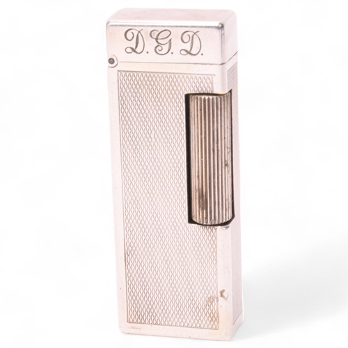 621 - A vintage Dunhill silver plated Rollagas lighter, with unusual automatic flip-top mechanism, engine ... 