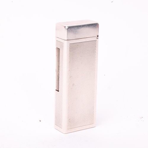 621 - A vintage Dunhill silver plated Rollagas lighter, with unusual automatic flip-top mechanism, engine ... 