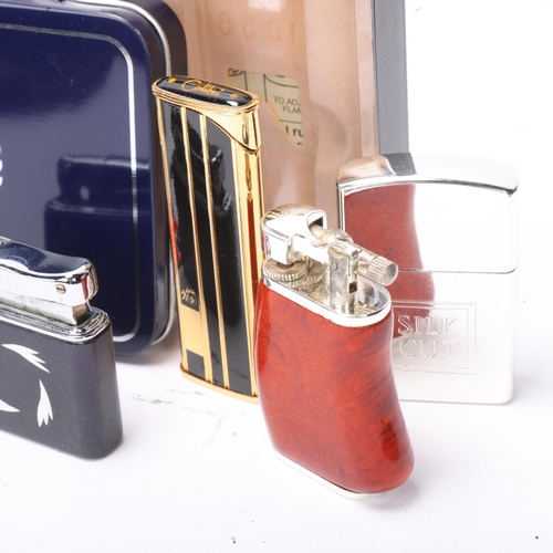 628 - A collection of lighters, two boxed Ronson Centenary, boxed Zippo, Colibri etc. (8)