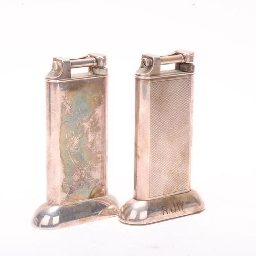 629 - 2 vintage Dunhill silver plated table lighters, makers marks to hammer arm, height 10.5cm