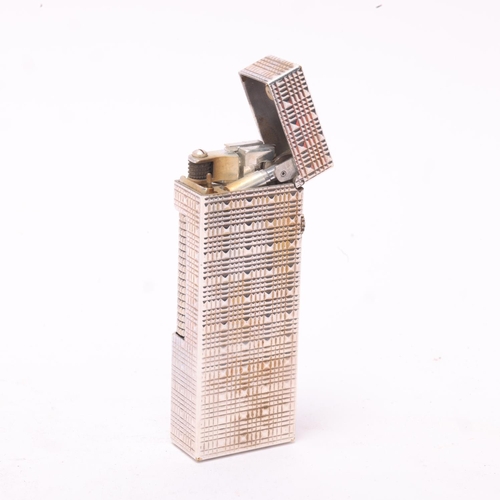 631 - A vintage Dunhill Rollagas lighter, with silver plated textured body, makers marks to base, length 6... 