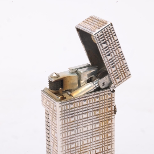 631 - A vintage Dunhill Rollagas lighter, with silver plated textured body, makers marks to base, length 6... 