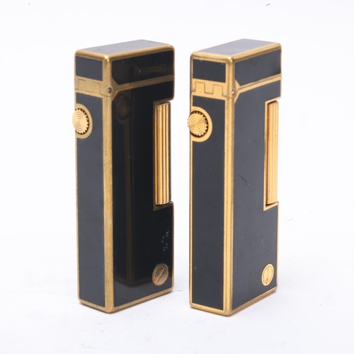 635 - 2 vintage Dunhill Rollagas lighters, gold plated and black lacquer bodies, makers marks to base, len... 