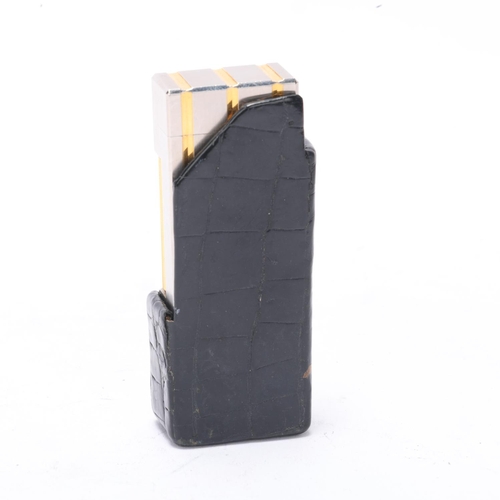 639 - A vintage Dunhill Rollagas silver and gold plated lighter, in Dunhill leather slip-case, makers mark... 