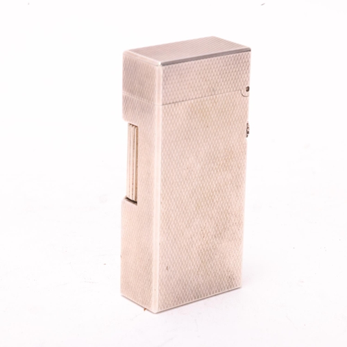 641 - A vintage Dunhill silver plated Rollagas lighter, engine tuned body, makers marks to base No 50230, ... 