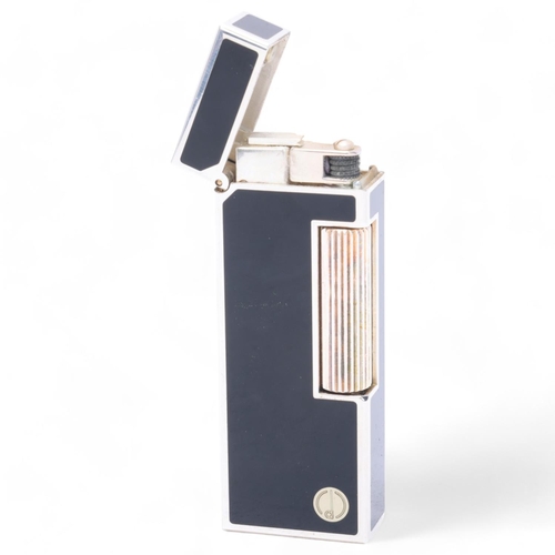 642 - A vintage Dunhill Rollagas lighter, silver plated with black lacquer panels, makers marks to base No... 