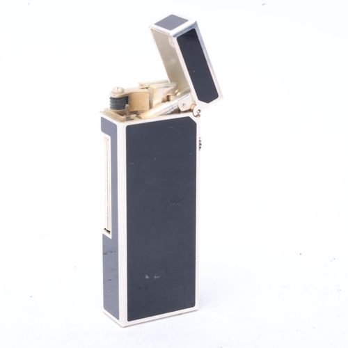 642 - A vintage Dunhill Rollagas lighter, silver plated with black lacquer panels, makers marks to base No... 