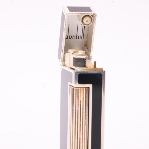 642 - A vintage Dunhill Rollagas lighter, silver plated with black lacquer panels, makers marks to base No... 