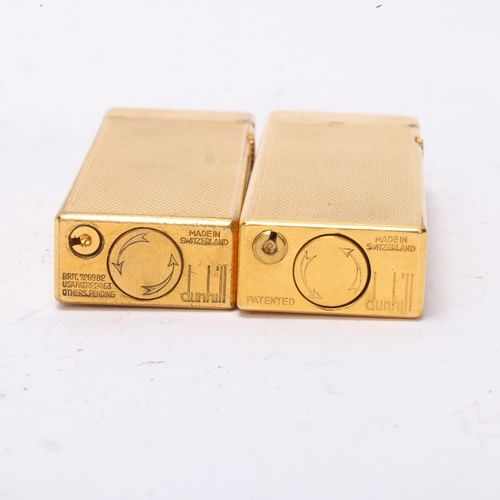 643 - 2 vintage Dunhill gold plated Rollagas lighters, with engine turned bodies, mechanism USA Pat No 165... 