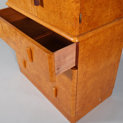 1 - Art Deco birdseye maple tallboy, 2 doors above enclosing shelved interior with 3 long drawers below ... 