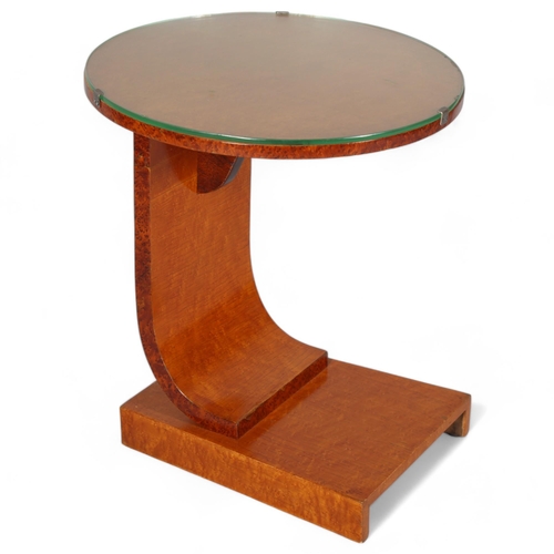 100 - Art Deco maple circular occasional table, with glass top and platform base, top diameter 46cm, heigh... 