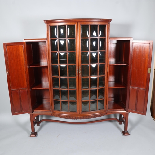 124 - Shapland & Petter, an Art Nouveau mahogany display cabinet, 2 central doors with bow-glass panels (1... 