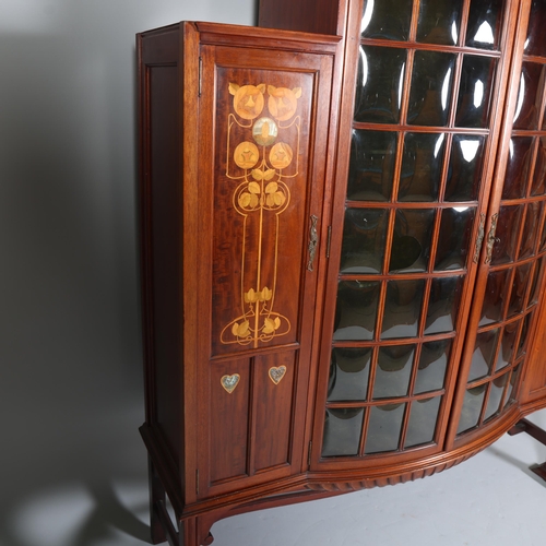 124 - Shapland & Petter, an Art Nouveau mahogany display cabinet, 2 central doors with bow-glass panels (1... 