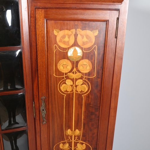 124 - Shapland & Petter, an Art Nouveau mahogany display cabinet, 2 central doors with bow-glass panels (1... 