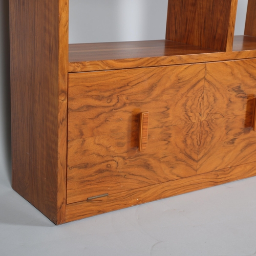 129 - Art Deco walnut stepped open bookcase with drop-front cupboard below, width 77cm, height 107cm