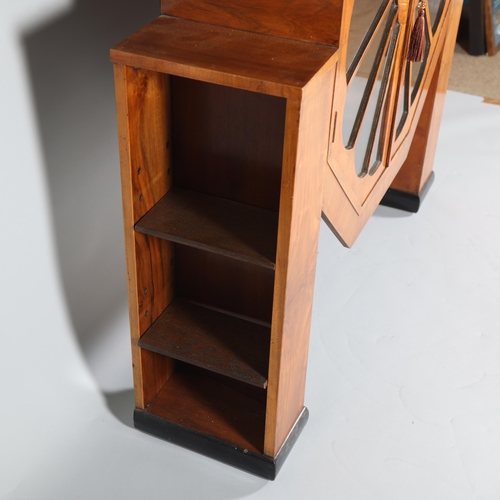 138 - An Art Deco Octagonal shaped display cabinet,  walnut veneer cabinet on ebonised feet, with shelves ... 