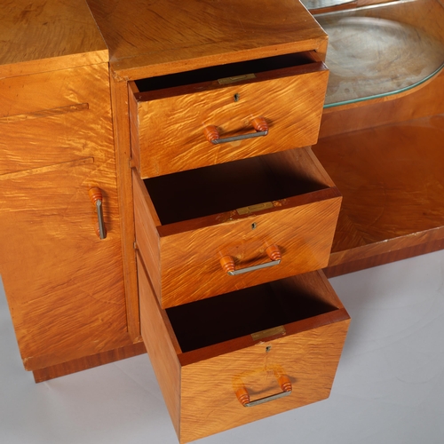 2 - Art Deco satinwood dressing table, circa 1920, circular mirror-back with end cupboard, central 3-dra... 