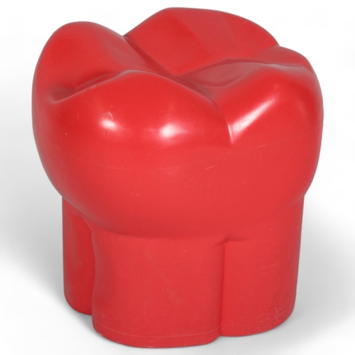 265 - A red plastic stool in the form of a molar or tooth, possibly from a dentist’s waiting room, with mo... 