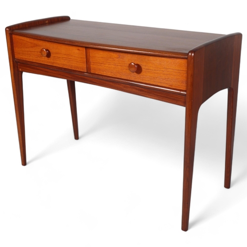 326 - JOHN HERBERT for A Younger Ltd, a teak console table or desk with two drawers, makers label to back ... 