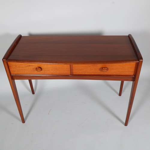 326 - JOHN HERBERT for A Younger Ltd, a teak console table or desk with two drawers, makers label to back ... 