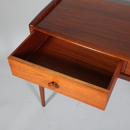 326 - JOHN HERBERT for A Younger Ltd, a teak console table or desk with two drawers, makers label to back ... 