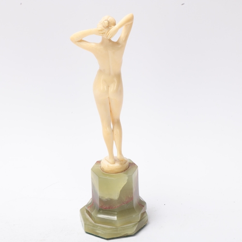 28 - Art Nouveau simulated ivory Classical nude on onyx base, unsigned, height 18cm