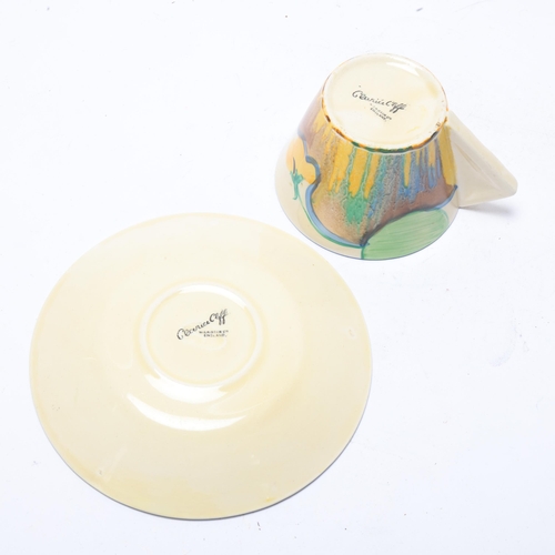 54 - Clarice Cliff Delicia Pansies cup and saucer, saucer diameter 14.5cm