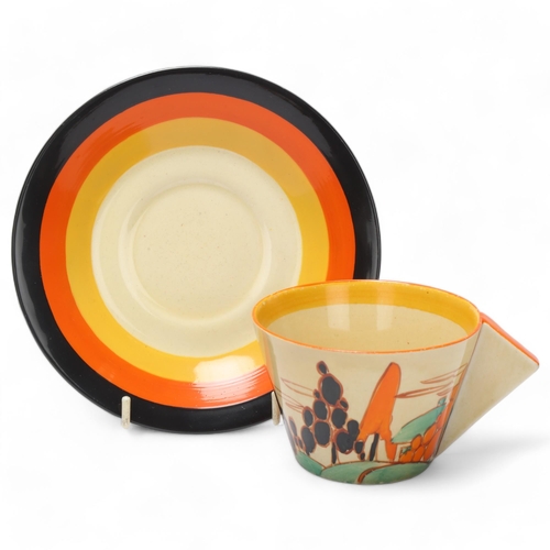 63 - Clarice Cliff Orange Trees And House cup and saucer, circa 1931, saucer diameter 17cm