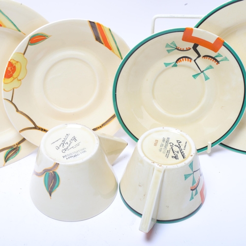 66 - 2 Clarice Cliff Art Deco Bizarre teacups saucers and side plates (2)