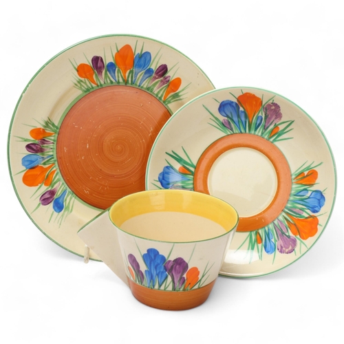 75 - Clarice Cliff Bizarre Crocus pattern teacup saucer and side plate, plate diameter 17cm