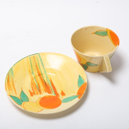 76 - Clarice Cliff Bizarre Delicia Peaches pattern cup and saucer, saucer diameter 15cm