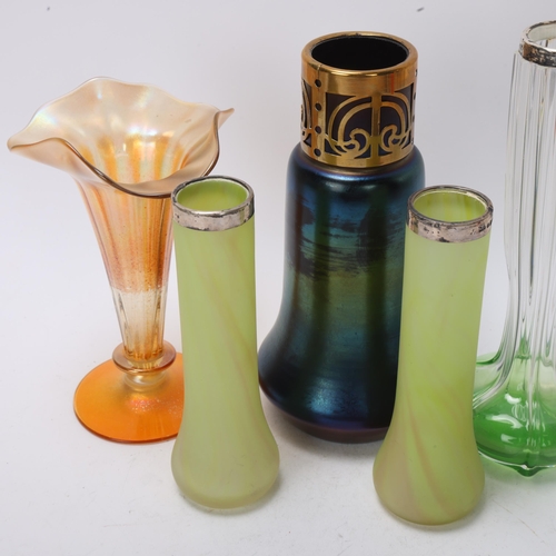 96 - A group of Art Nouveau iridescent glass items, including a brass-mounted Loetz style vase, height 19... 