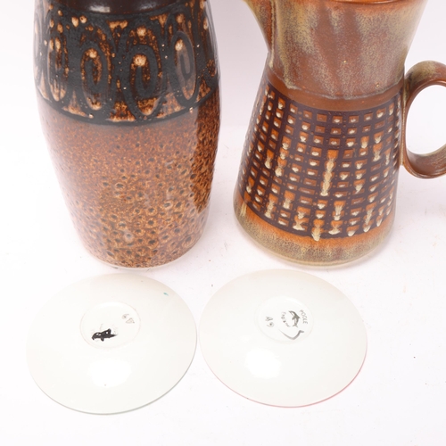 257 - A Iden/Rye pottery vase and coffee pot, together with two Poole Pottery dishes, all with makers mark... 