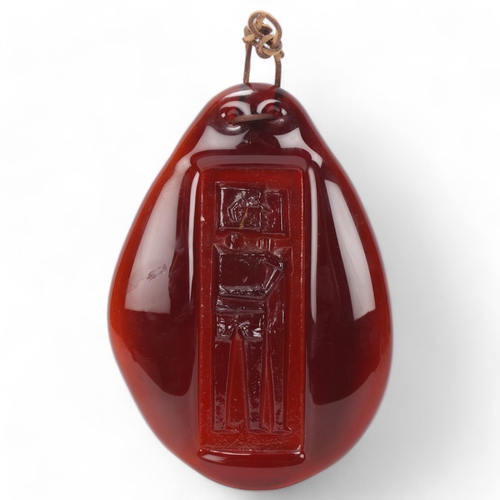 271 - ERIK HOGLUND for Boda Afors, a suncatcher in red glass designed 1950’s, signed on the reverse H866/D... 