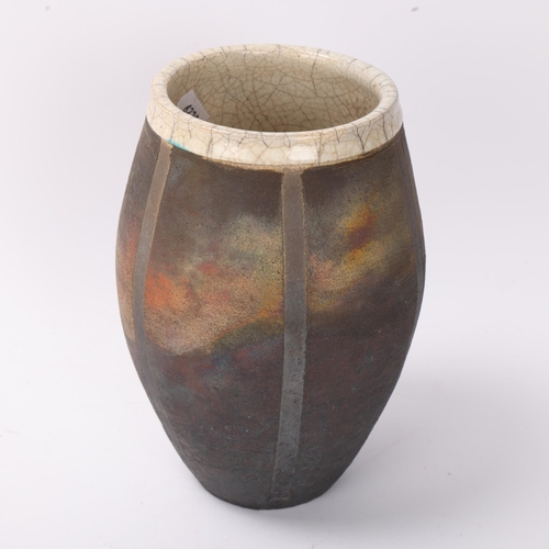 289 - A studio pottery raku fired barrel vase, with resist stripes and crackle glaze interior, makers mark... 