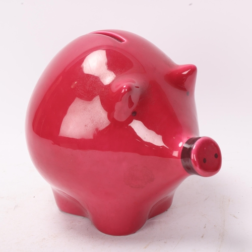 318 - A Baldelli, Italy ceramic piggybank with red/burgundy glaze,  factory mark to base, height 17.5cm